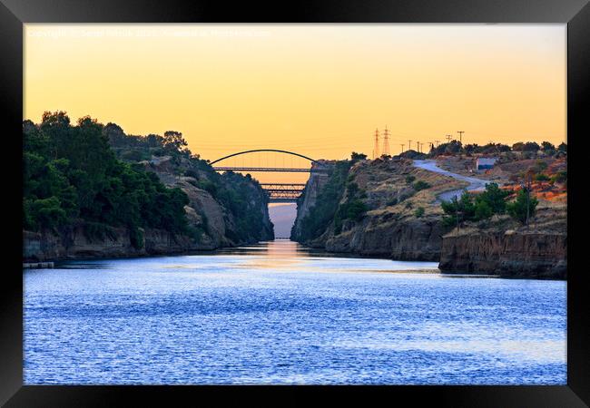 View of the transport bridges over the Corinth Canal in Greece against the morning light of the beginning day. Framed Print by Sergii Petruk