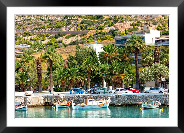 Scenic views of the bays of Loutraki, Greece, where old fishing schooners, boats and boats moor in the clear waters of the Ionian Sea. Framed Mounted Print by Sergii Petruk