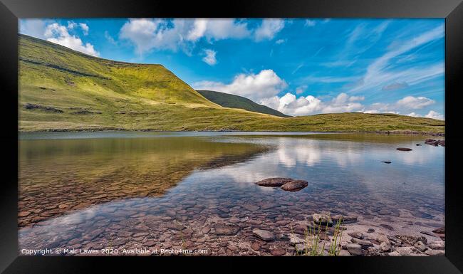 A Mountain lake  Framed Print by Malc Lawes