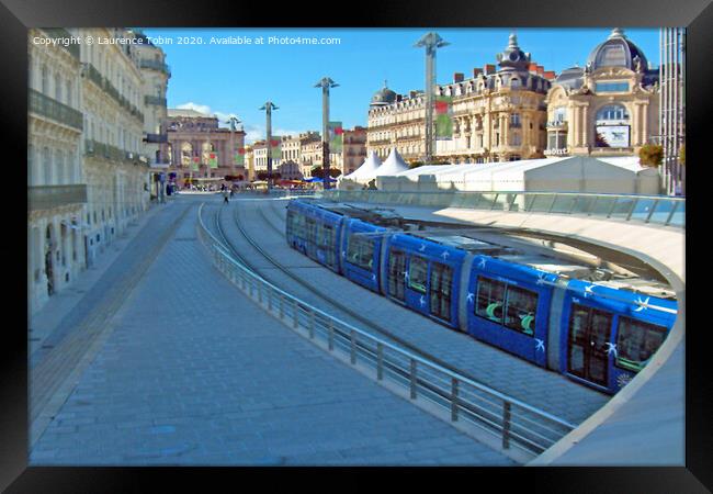 Tramway in Montpellier, France Framed Print by Laurence Tobin