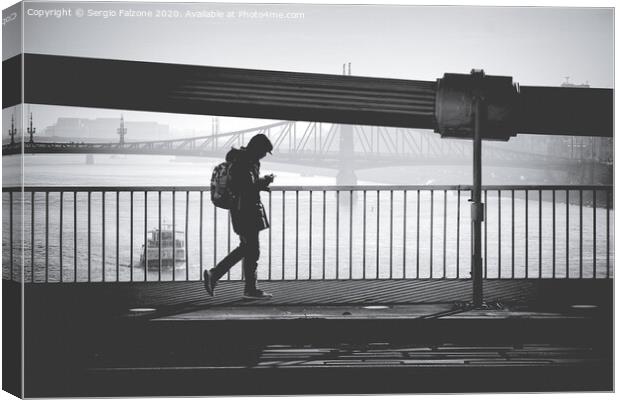Walking on the bridge Canvas Print by Sergio Falzone