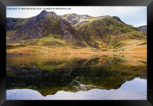 Llyn Idwal Lake Reflecting Y Garn in Snowdonia Framed Print by Pearl Bucknall