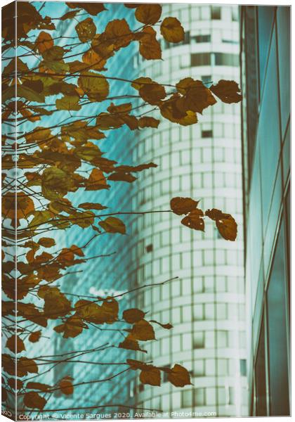 Yellow leaves and modern building Canvas Print by Vicente Sargues
