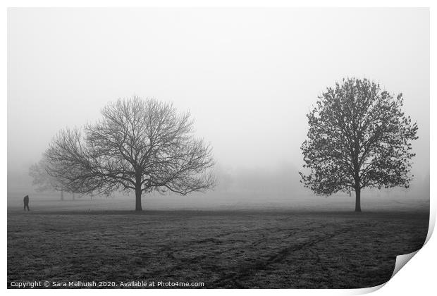 Two trees and a man in the fog Print by Sara Melhuish