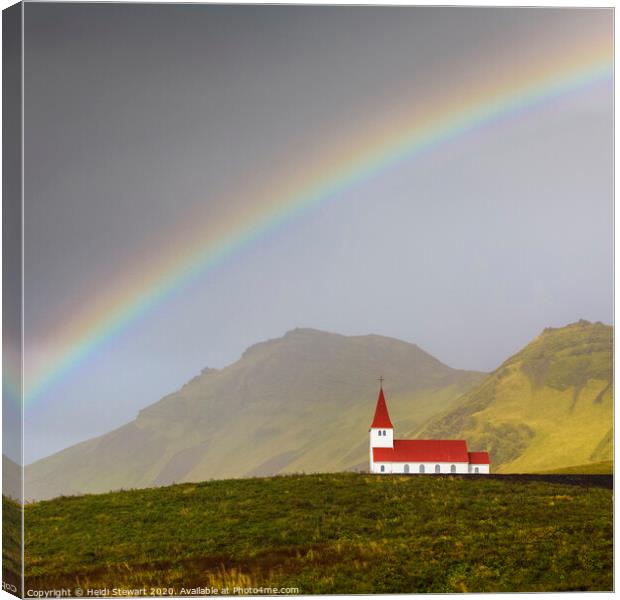 Rainbow Over Vik Church in Iceland Canvas Print by Heidi Stewart