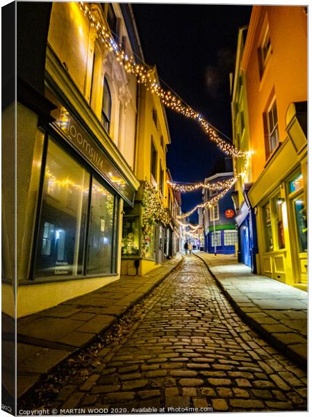 The Old High Street, Folkestone, by night  Canvas Print by MARTIN WOOD