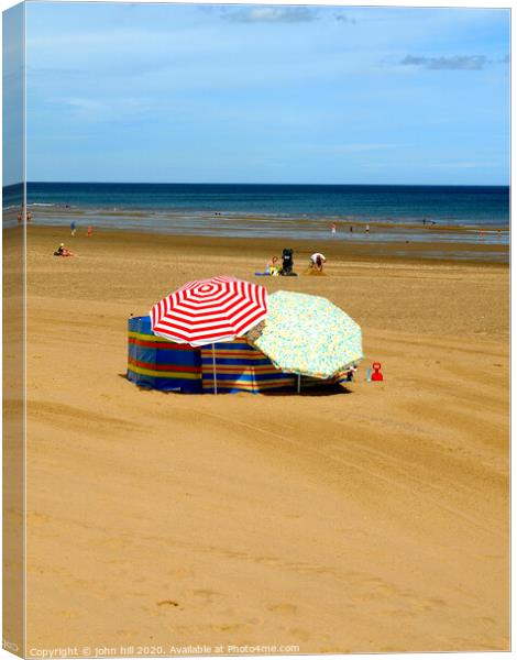 Parasol party at Mablethorpe in Lincolnshire. Canvas Print by john hill