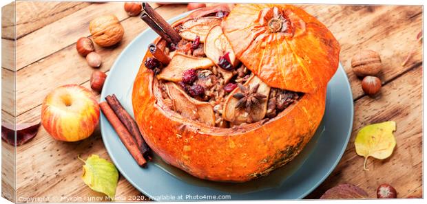 Pumpkin stuffed with dried fruits Canvas Print by Mykola Lunov Mykola