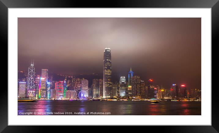night view of Hong Kong island Framed Mounted Print by Sergio Delle Vedove