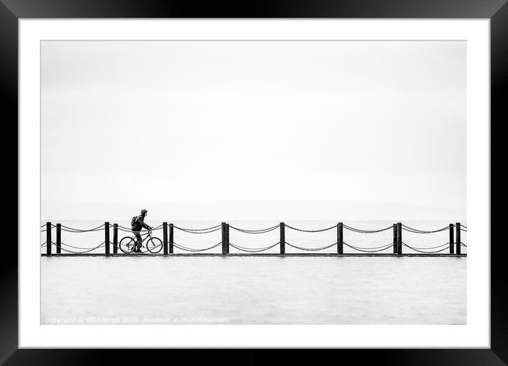 Cycling the marine wall. Framed Mounted Print by Bill Allsopp