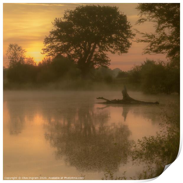 Mist over a pond at sunrise Print by Clive Ingram