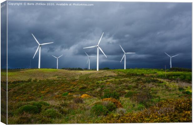 Windmills against dramatic sky. Canvas Print by Boris Zhitkov