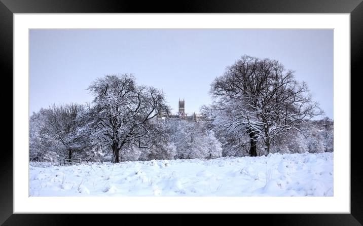 Lincoln cathedral in winters snow Framed Mounted Print by Jon Fixter