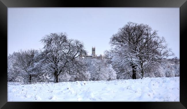 Lincoln cathedral in winters snow Framed Print by Jon Fixter