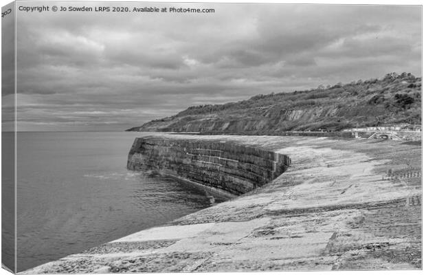 The Cobb, Lyme Regis in Mono. Canvas Print by Jo Sowden