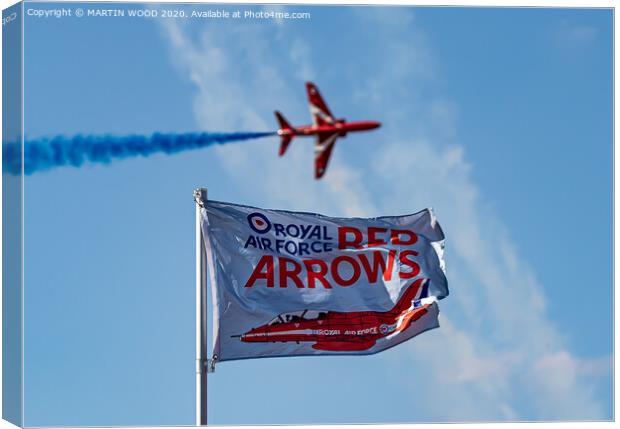 Red Arrows - Flying the Flag Canvas Print by MARTIN WOOD