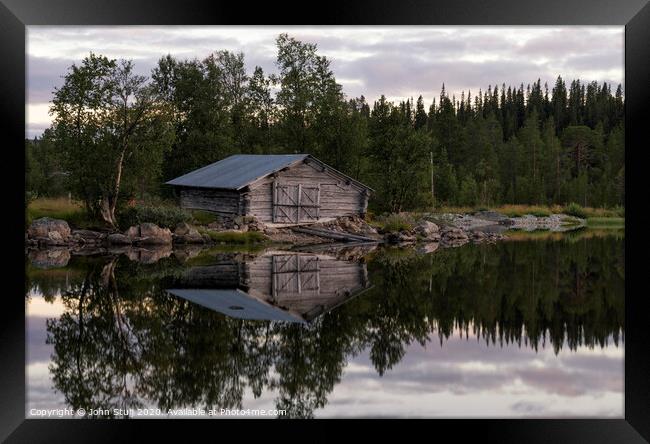 Boathouse on a Swedish lake Framed Print by John Stuij