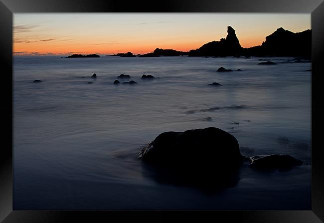 Sunset over the sea at Hartland Framed Print by Pete Hemington