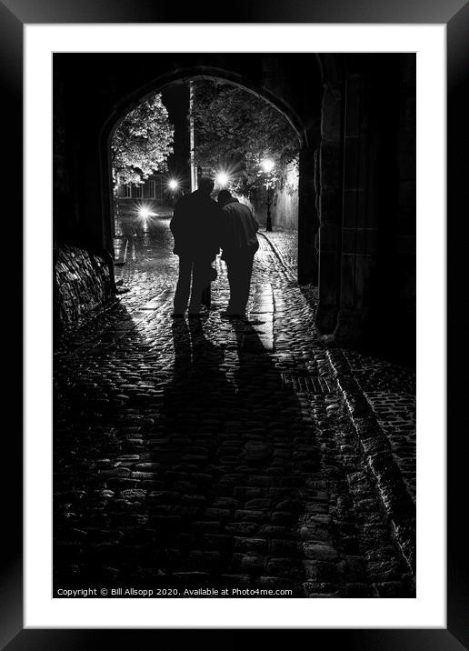 A conversation in the shadows. Framed Mounted Print by Bill Allsopp