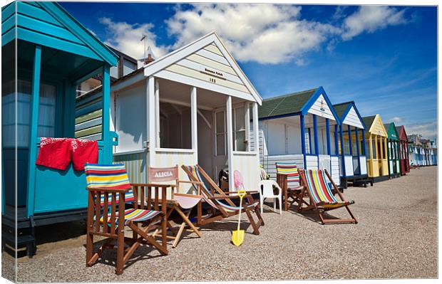 Deck chairs and beach huts Canvas Print by Stephen Mole