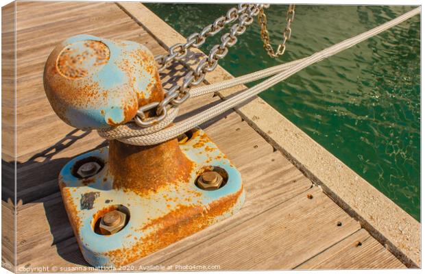 detail of a bollard with chains and ropes for moor Canvas Print by susanna mattioda