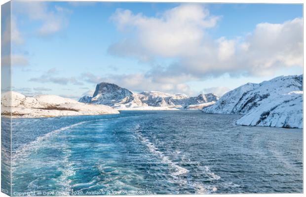Cruising between the islands in Winter in Norway Canvas Print by Dave Collins