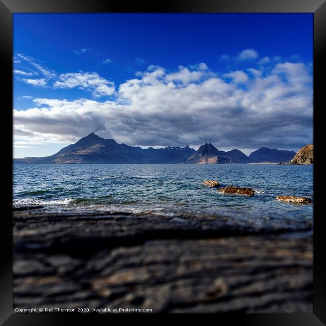 Black Cuillins and blue skies from Elgol Framed Print by Phill Thornton