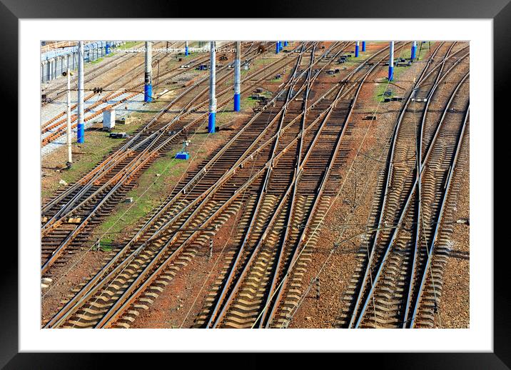 A powerful network of multi-channel railway tracks with a turn for the passage of electric trains. Framed Mounted Print by Sergii Petruk