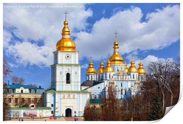 The famous Mikhailivsky Golden-Domed Cathedral and the bell tower in Kyiv in early spring against a blue cloudy sky. Print by Sergii Petruk