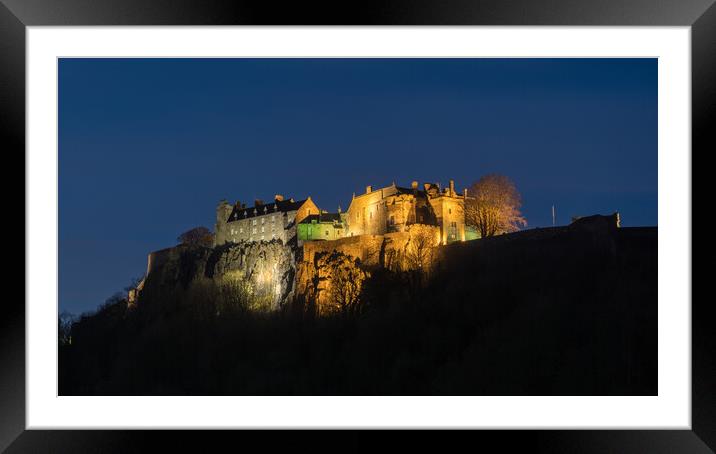 Stirling Castle illuminated at night. Framed Mounted Print by Tommy Dickson
