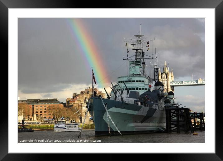 HMS Belfast fires a rainbow. Framed Mounted Print by Paul Clifton