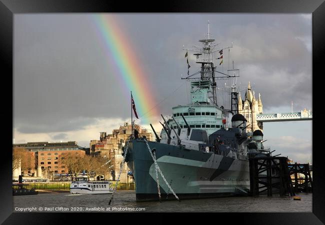 HMS Belfast fires a rainbow. Framed Print by Paul Clifton