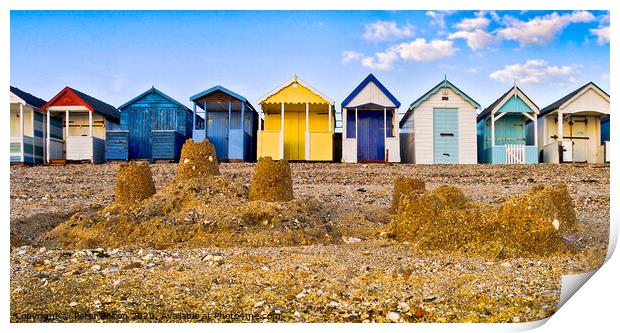 Beach huts and sandcastles at Thorpe Bay, Thames Estuary, Essex, UK. Print by Peter Bolton