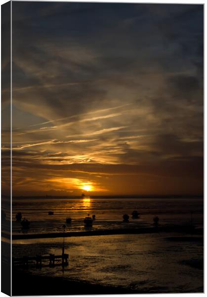 A fine sunset in portrait format at Westcliff on Sea, Essex, UK. Canvas Print by Peter Bolton