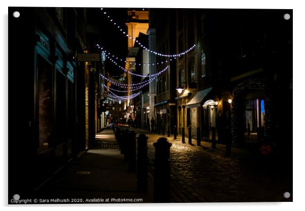 Cobblestones and Christmas lights Acrylic by Sara Melhuish