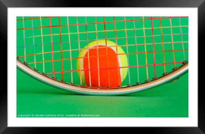 a racket and a tennis ball Framed Mounted Print by daniele mattioda