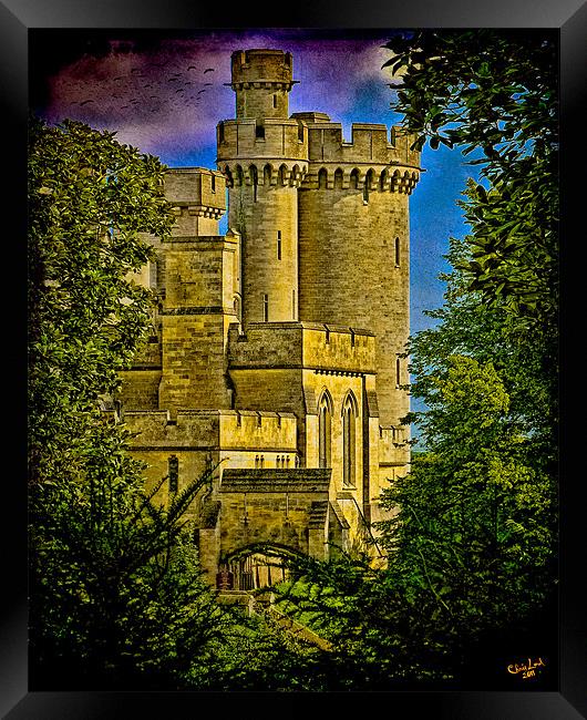 Arundel Castle Through the Trees Framed Print by Chris Lord