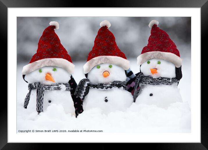Snowmen with Christmas hats Framed Mounted Print by Simon Bratt LRPS