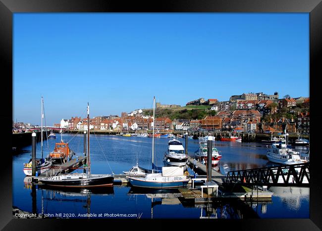 The harbour in November at Whitby in Yorkshire. Framed Print by john hill
