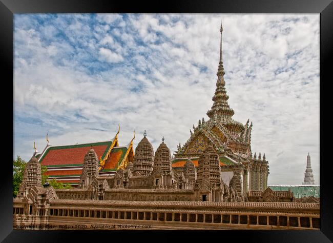 Temple buildings at The Grand Palace, Bangkok, Thailand. Framed Print by Peter Bolton