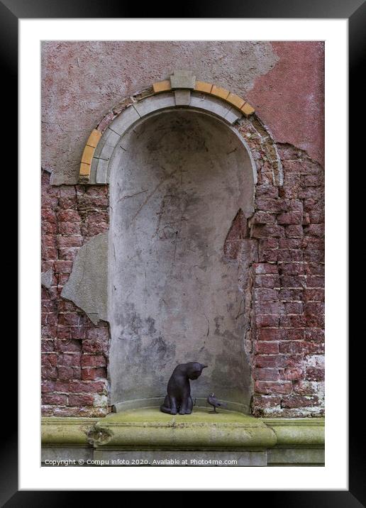 old wall wth cat and bird Framed Mounted Print by Chris Willemsen