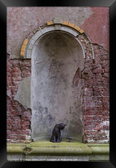 old wall wth cat and bird Framed Print by Chris Willemsen