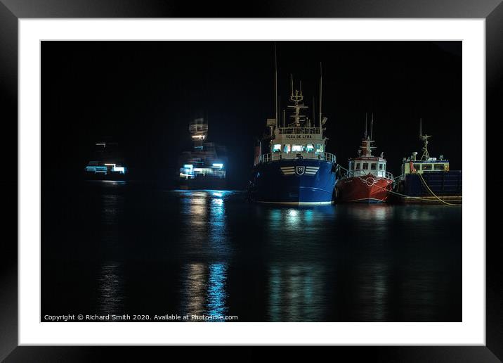 Fishing boats depart for the next days work. Framed Mounted Print by Richard Smith