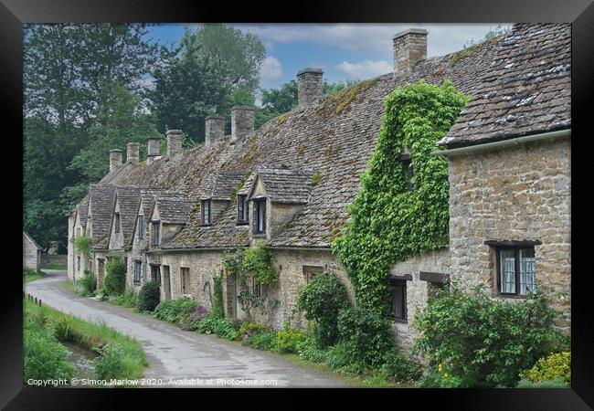 Enchanting Cotswold Cottages Framed Print by Simon Marlow
