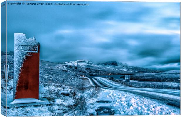 Frozen road passing The Storr Canvas Print by Richard Smith