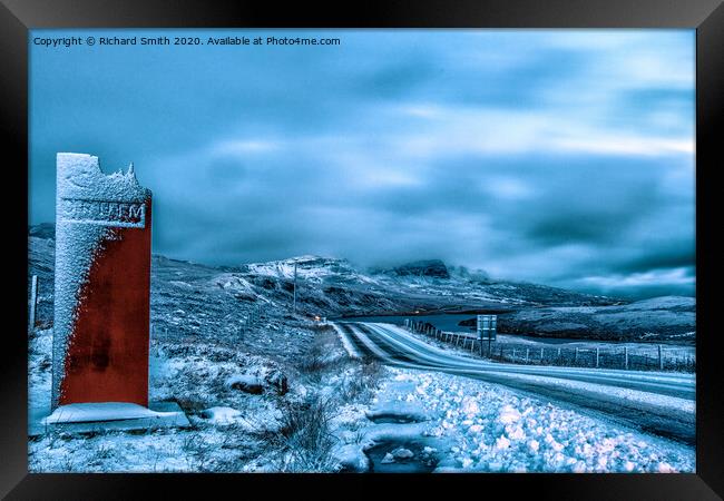 Frozen road passing The Storr Framed Print by Richard Smith