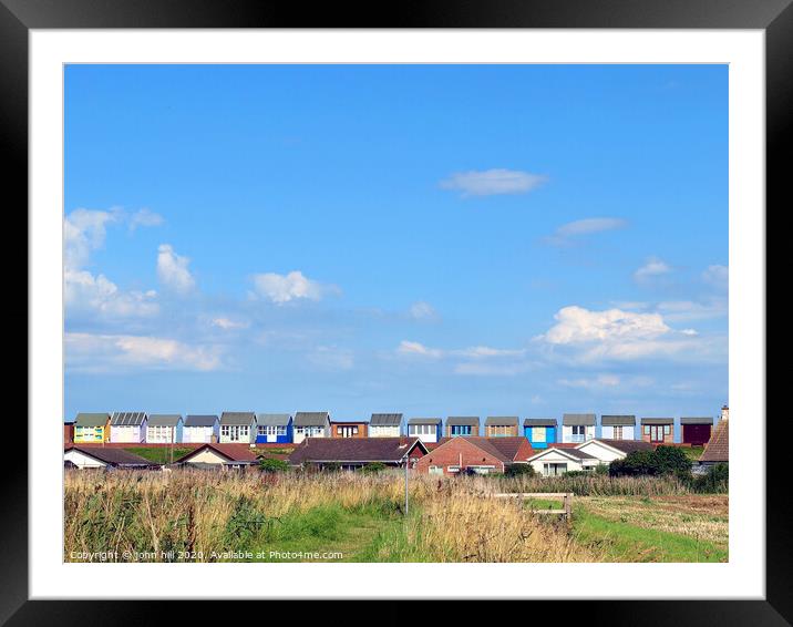The backs of beach huts at Sandilands in Lincolnshire Framed Mounted Print by john hill