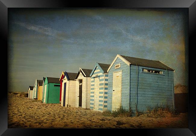 Beach Huts at Southwold, Suffolk Framed Print by Dave Turner