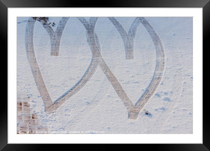 imprint of two hearts drawn in the snow Framed Mounted Print by susanna mattioda