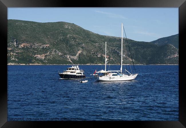 Yachts Passing in Greece Framed Print by chris hyde